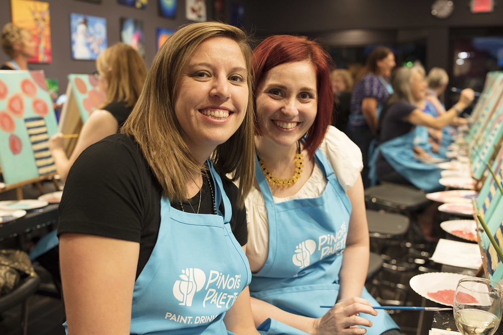 two women smiling