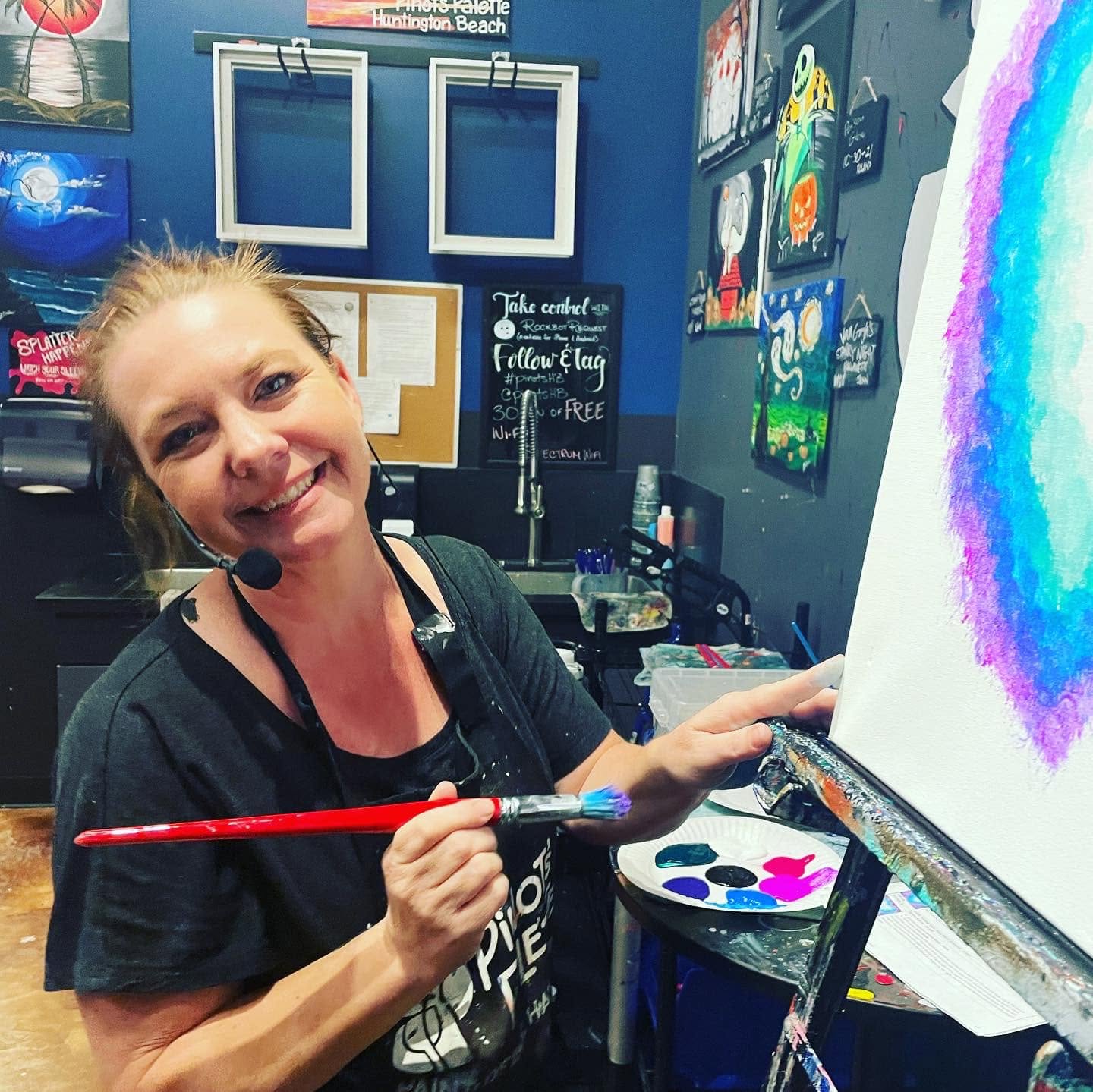 Jennifer English painting at Pinot’s Palette Huntington Beach during an adult paint and sip class.
